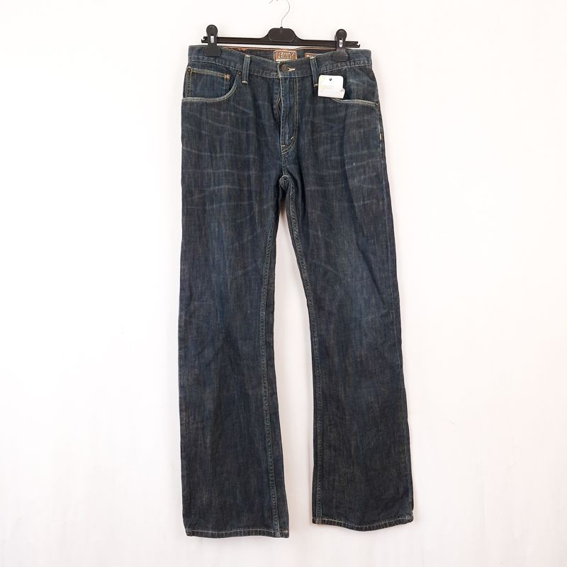 Levi's 557 Relaxed Bootcut Talla ESPAÑA 42 W33 de Segunda Mano